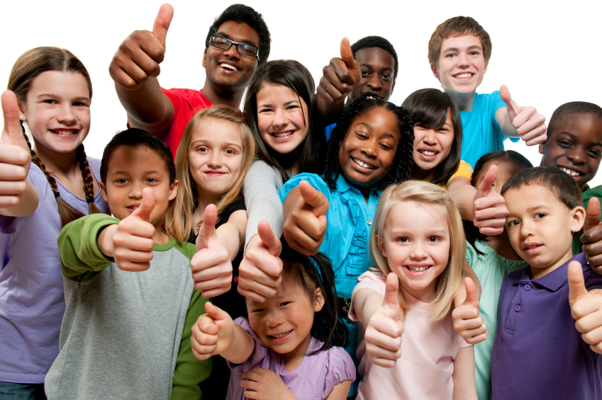 Children with thumbs up to be at school